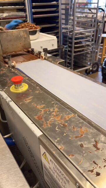 Stuart, our enrobing machine is super fast and mesmerizing to watch! 
This is how we cover our delicious treats and truffles. 

We made some Pretzel Bits Bags for all of our chocolate covered pretzel fans out there. 

Which is your favorite treat?

#stargazerfinechocolatesandcoffeebar #denverchocolate #denversmallbusiness #denverfamilybusiness #chocolateshop